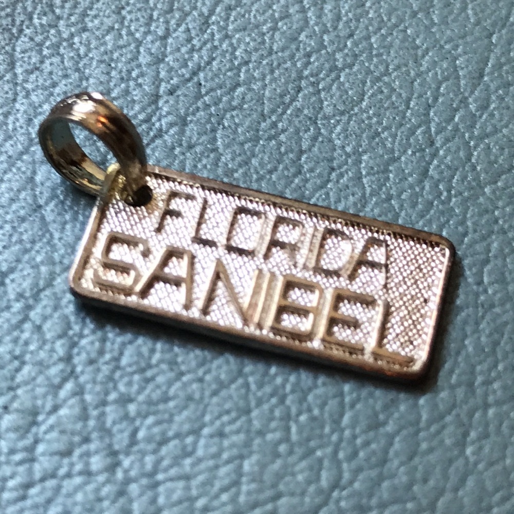 Sanibel Florida sterling silver pendant. Never Worn. New!